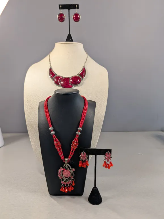 Two Red Costume Jewelry Sets with Necklaces and Earrings