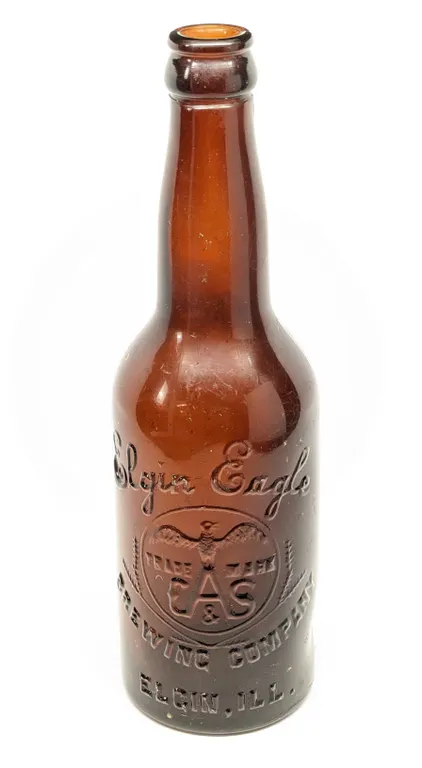 12 OZ PRE PROHIBITION EMBOSSED BEER BOTTLE ELGIN EAGLE BREWING CO ELGIN ILLINOIS