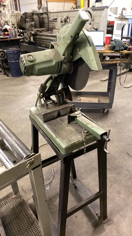 HITACHI CUT OFF SAW ON METAL STAND