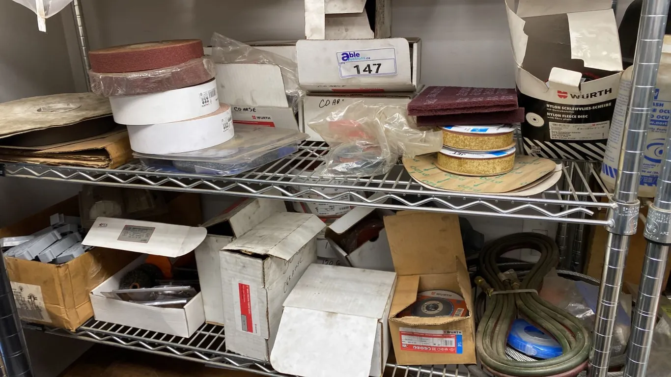 TWO SHELVES OF ASST ABRASIVES. APPROX 10 ROLLS EMERY PAPER, SEVERAL BOXES WURTH 2" SANDING DISCS,