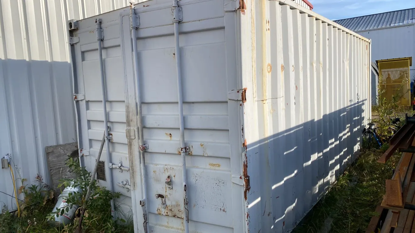 20' STORAGE CONTAINER. SPRAY FOAM INSULATED. METAL SHELVES. HAS BEEN USED FOR COMPRESSOR. 101"H