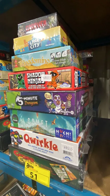 2 STACKS OF ASSORTED BOARD GAMES- SOME UNSEALED