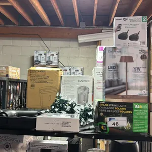 SHELF OF MASSAGE GUNS, STRING LIGHTS, TABLE LAMPS & CERAMIC HEATER: *WORKING CONDITION UNKNOWN/MAY