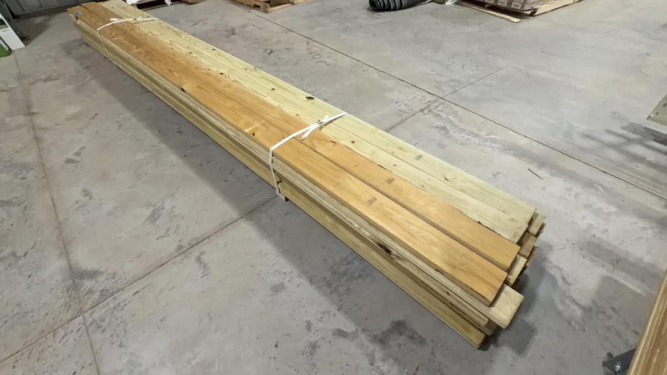 Bundle of Green Treated Lumber