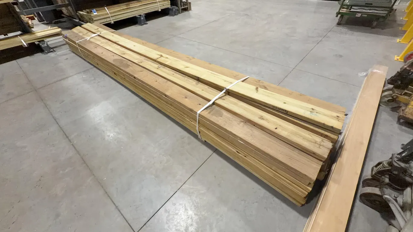 Bundle of Green Treated Lumber