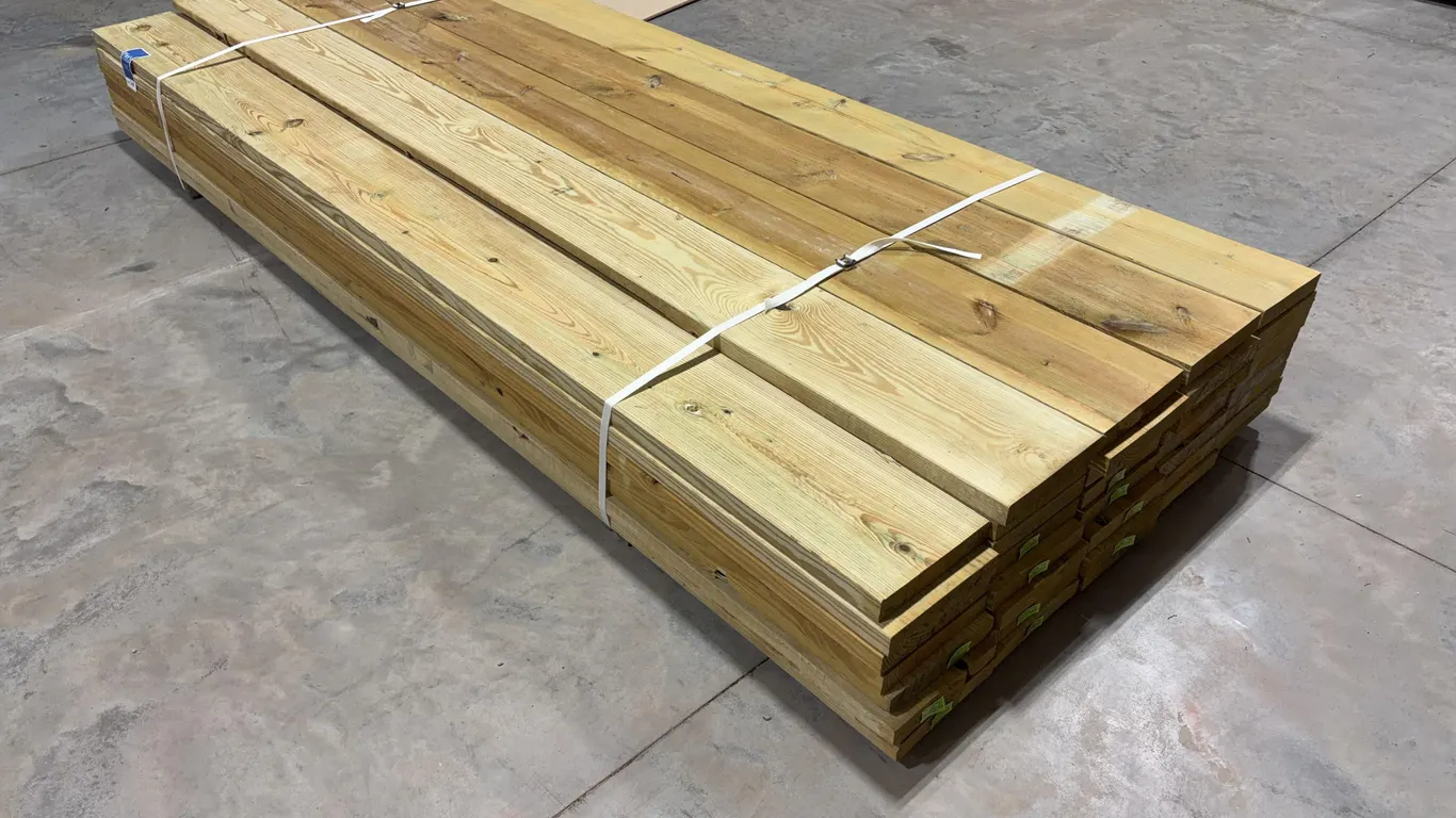 Bundle of Green Treated Lumber