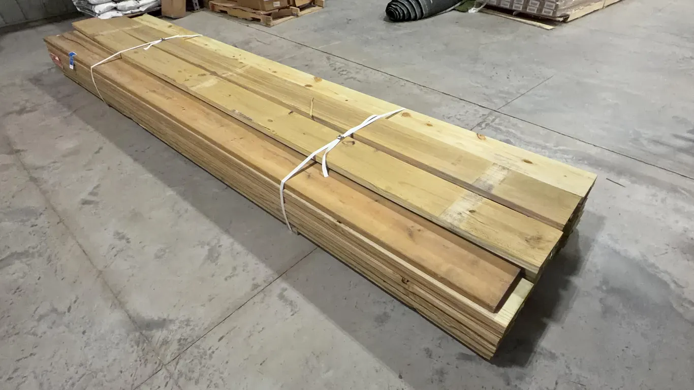 Bundle of Green Treated Lumber