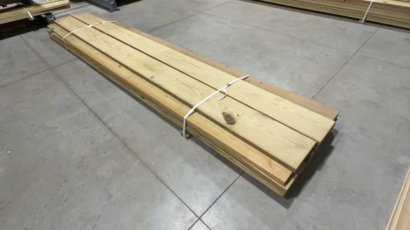 Bundle of Green Treated Lumber