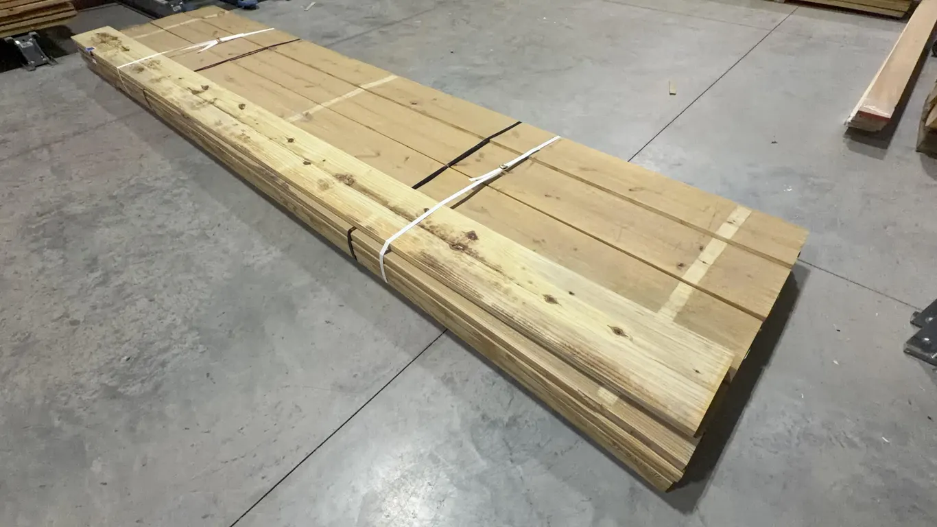Bundle of Green Treated Lumber