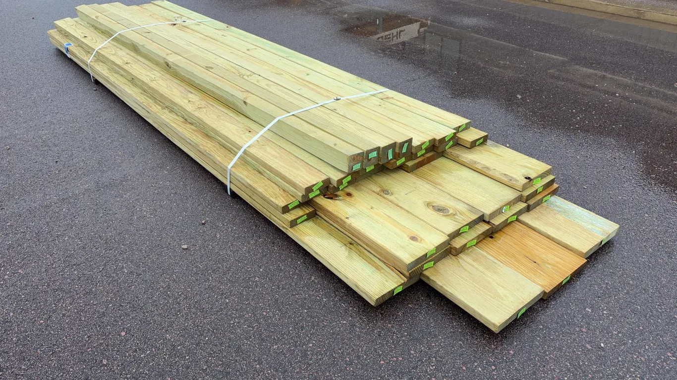Bundle of Green Treated Lumber