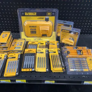 Assortment of DeWalt Batteries, Charger, Saw Blades, and Brad Nails