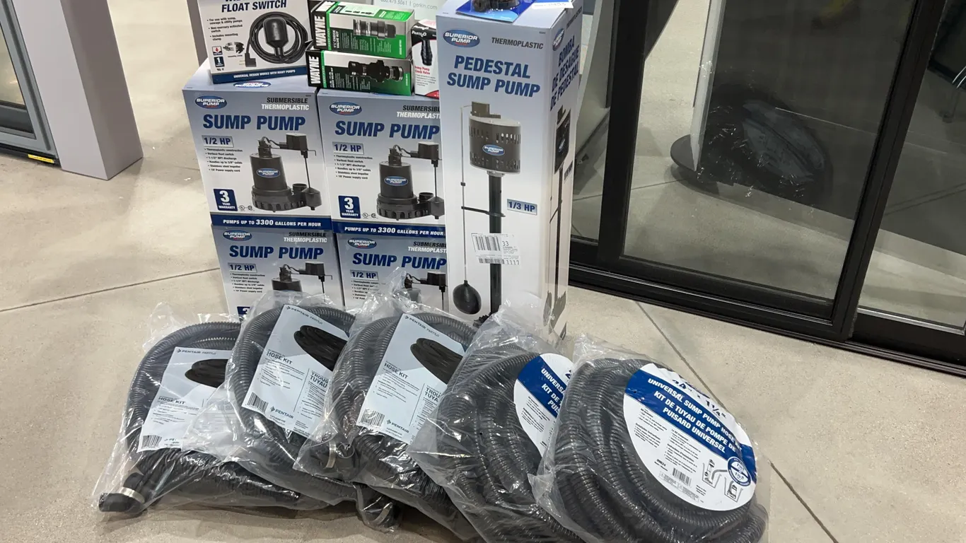 Assortment of Sump Pumps and Accessories