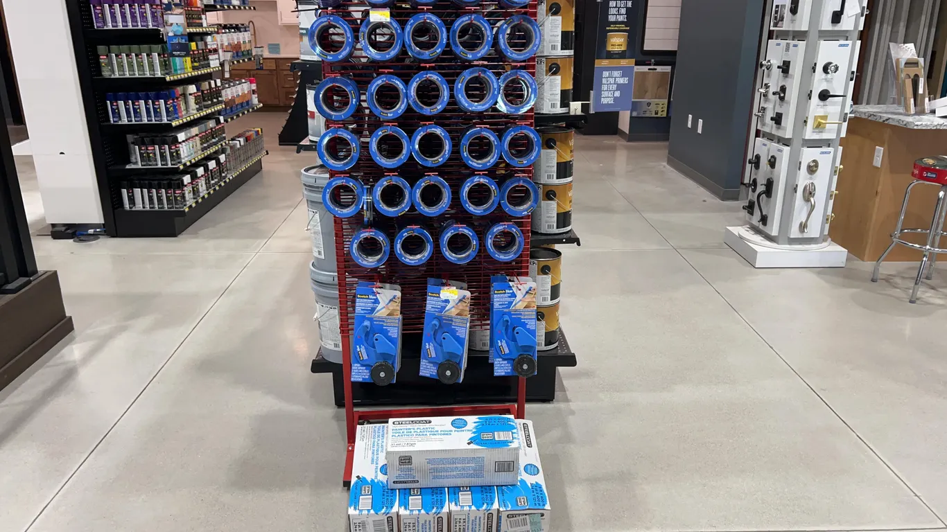 Assortment of Painters Tape, Dispensers, and Painters Plastic