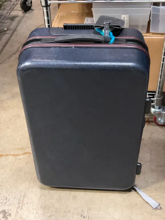 Black Hard Shell Upright Suitcase with Wheels and Handle