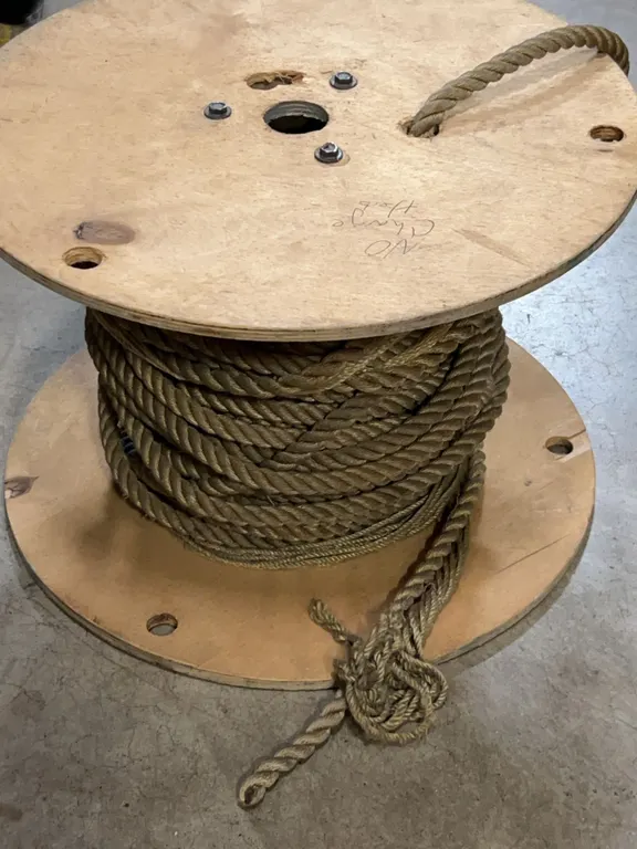 Large Wooden Spool With Heavy Coiled Fiber Rope