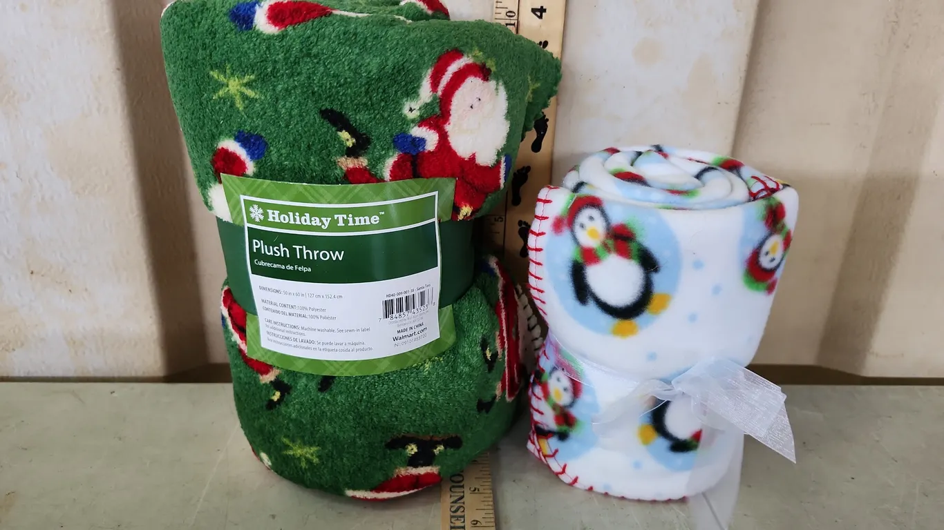 2 Holiday Throw Size Blankets