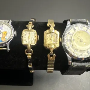 Four Wristwatches Including Windsor, Elco, and Character Themed Watch