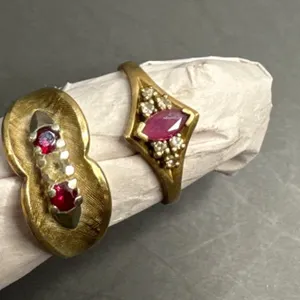 Gold-Tone Rings with Ruby-Colored Stones