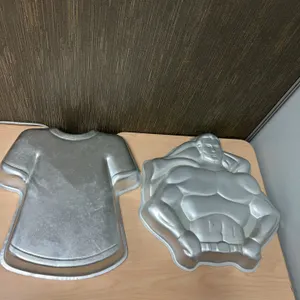 Wilton Superman and T-Shirt Aluminum Cake Pans, 1979, 1977