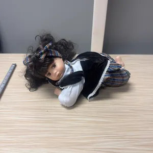 Laying Porcelain Doll