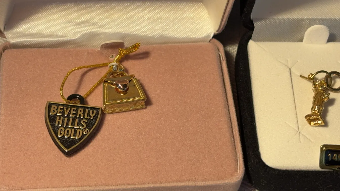 Two Charms Both Are 14 K