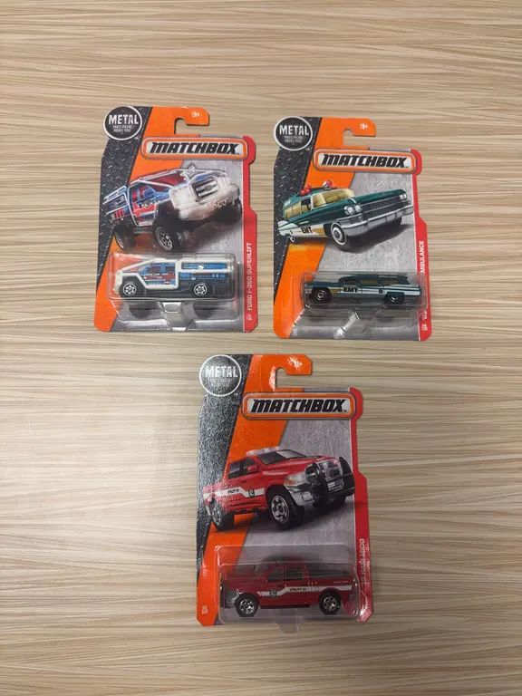 MATCHBOX 2016: Ford F350 super lift #73–63 Cadillac ambulance #88–15 ram 1500#62 