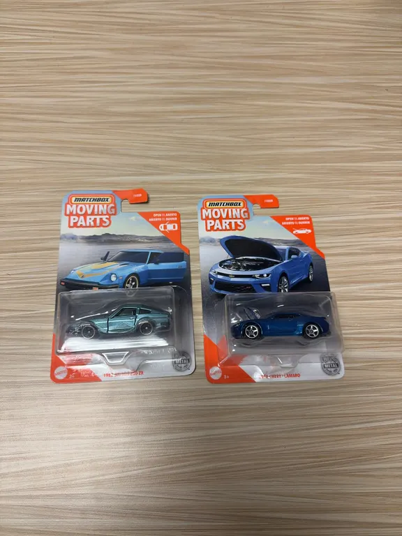 MATCHBOX MOVING PARTS : 1982 Datsun 280 ZX - 2016 Chevy Camaro