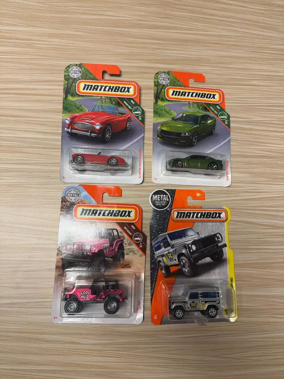 MATCHBOX:  1963 Austin Healey Roadster / 2018 Dodge charger / 60 Jeep 4 x 4 / Land Rover 90