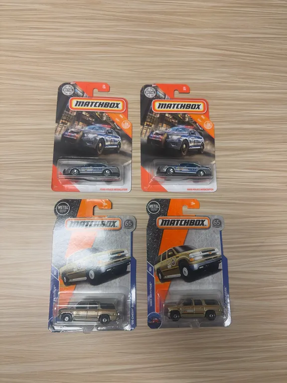 MATCHBOX: Ford police interceptor / 2000 Chevy suburban sheriff
