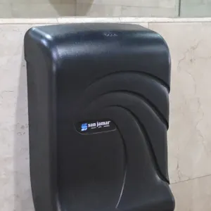 San Jamar restroom dispenser package with trash can. Includes wall-mounted San Jamar folded paper towel dispenser, San Jamar push soap dispenser, and 