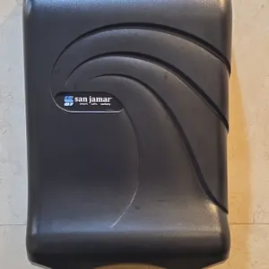 San Jamar restroom dispenser package with trash can. Includes San Jamar wall-mount roll paper towel dispenser, San Jamar wall-mount manual soap dispen