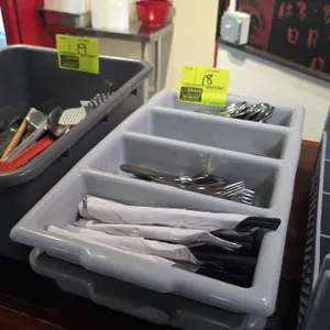 Poly 4-compartment utensil holders. Includes (2) gray polymer cutlery boxes, assorted stainless steel flatware (forks, knives, and spoons), and wrappe