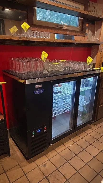 2022 Atosa SBB48GGR 2-door glass back bar cooler. Features a stainless steel top, black exterior finish, digital temperature control, interior lightin