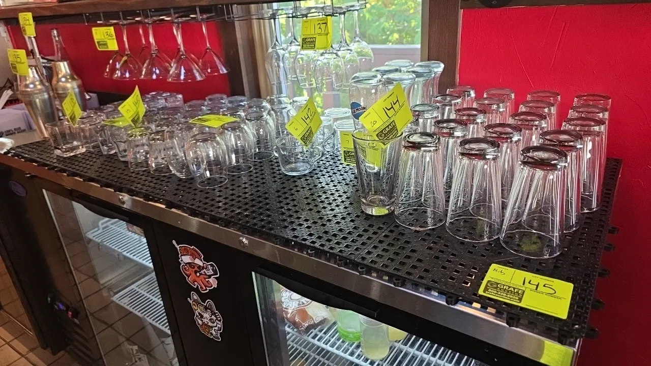Rubber interlocking bar mats. Includes (5) mats. Features a perforated drainage grid and interlocking tab edges. 12" x 24" each. Glassware, cooler, an