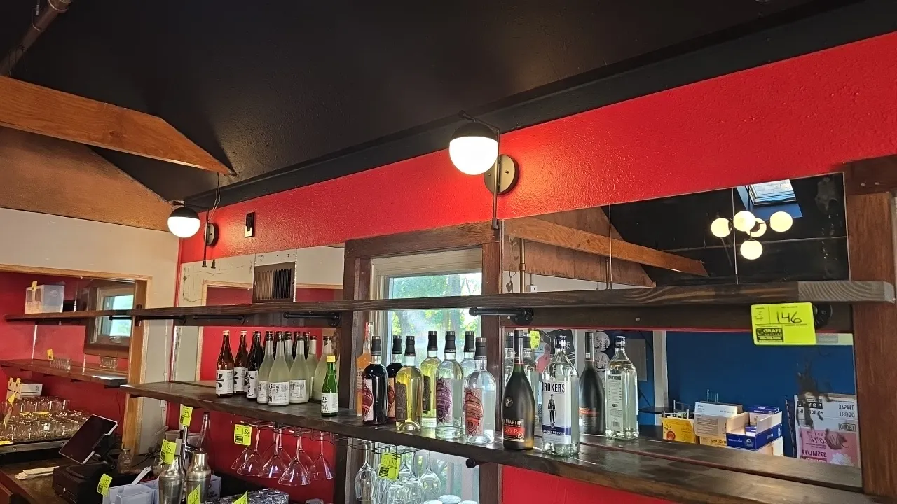 Solid wood shelves. Features dark wood finish and black metal pipe wall brackets. Dimensions: 9'9"L and 11.5'L. Note: Top shelves only. Lower shelves,