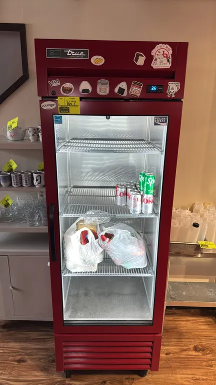 True T-23G-HC-FGD01 1-door reach-in glass display refrigerator. Features red exterior finish, framed glass door with LED lighting, digital temperature