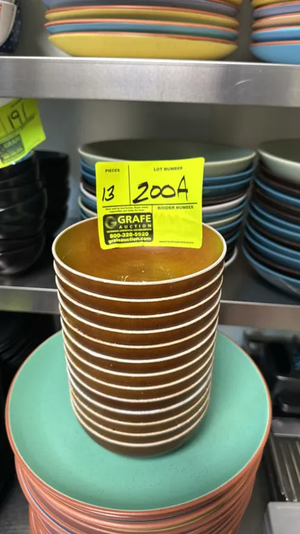 Polymer bowls. Features a brown faux woodgrain finish with white rim. Dimensions: 5"Dia. Plates and surrounding items not included.