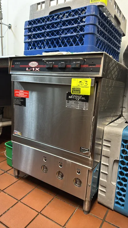 CMA Dishmachines Energy Mizer L-1X undercounter commercial dishwasher. Features stainless steel construction, front-loading drop-down door, top contro