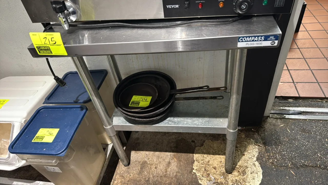 Compass PLGG-1830 stainless steel work table. Features a stainless steel top and galvanized undershelf. 30" x 18". Mounted on tubular legs with adjust