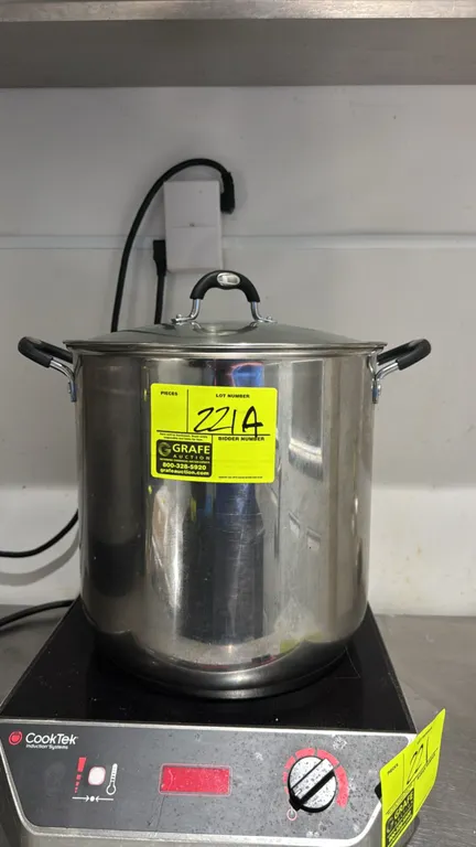 Tramontina 22 qt stainless steel stock pot with lid. Features tri-ply base construction, dual riveted side handles with grips, and a glass lid. Induct