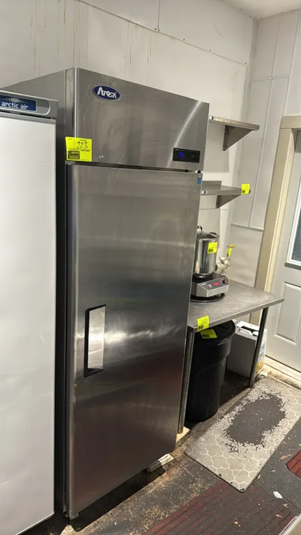 2023 Atosa MBF8004GR single-door reach-in cooler. Features stainless steel construction, solid door, (3) adjustable wire shelves, interior LED lightin