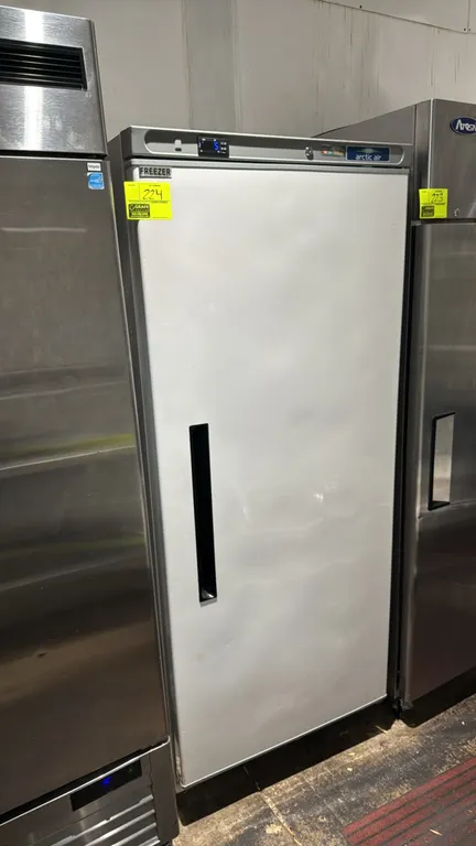 2024 Arctic Air AWF25Z commercial reach-in freezer. Features a single solid door, LED interior lighting, digital temperature display, and wire shelvin