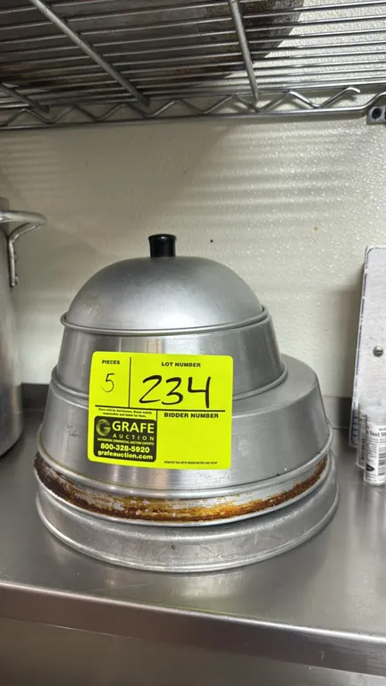 Aluminum steam lids. Features spun aluminum construction in assorted sizes and dome profiles, including a top handle knob.