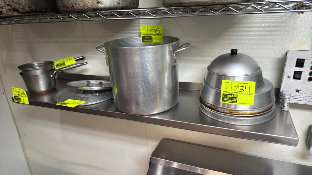 John Boos stainless steel wall shelf. Features a rear backsplash and stainless steel wall-mount brackets. 48" x 12". Contents not included.