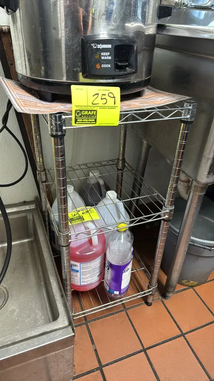 Chrome 3-tier wire rack. Features (3) wire shelves. 15" x 14" x 31". Contents and appliance not included.