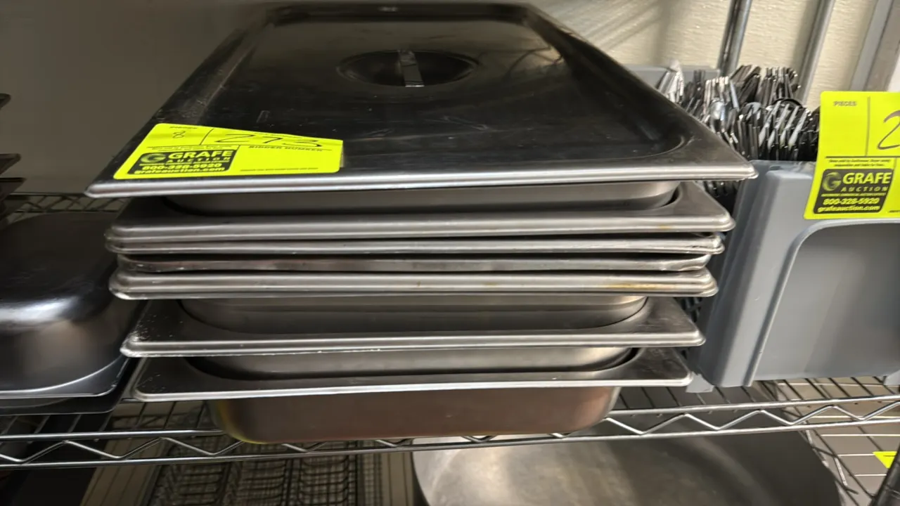 Full-size stainless steel insert pans. 2" depth. Includes stainless steel lid. Wire shelving and adjacent items not included.