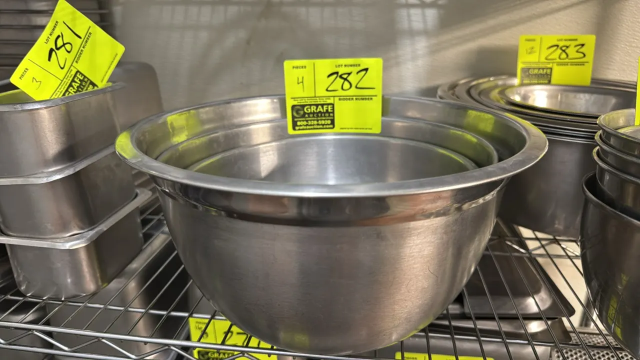 Stainless steel mixing bowls. Features rolled rims and nesting design. Dimensions: 9" to 11".