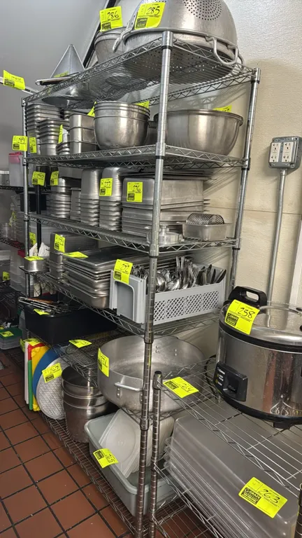 Chrome 6-tier wire shelving rack. Features adjustable wire shelves and NSF certification. 48"W x 18"D x 73"H. Contents not included.