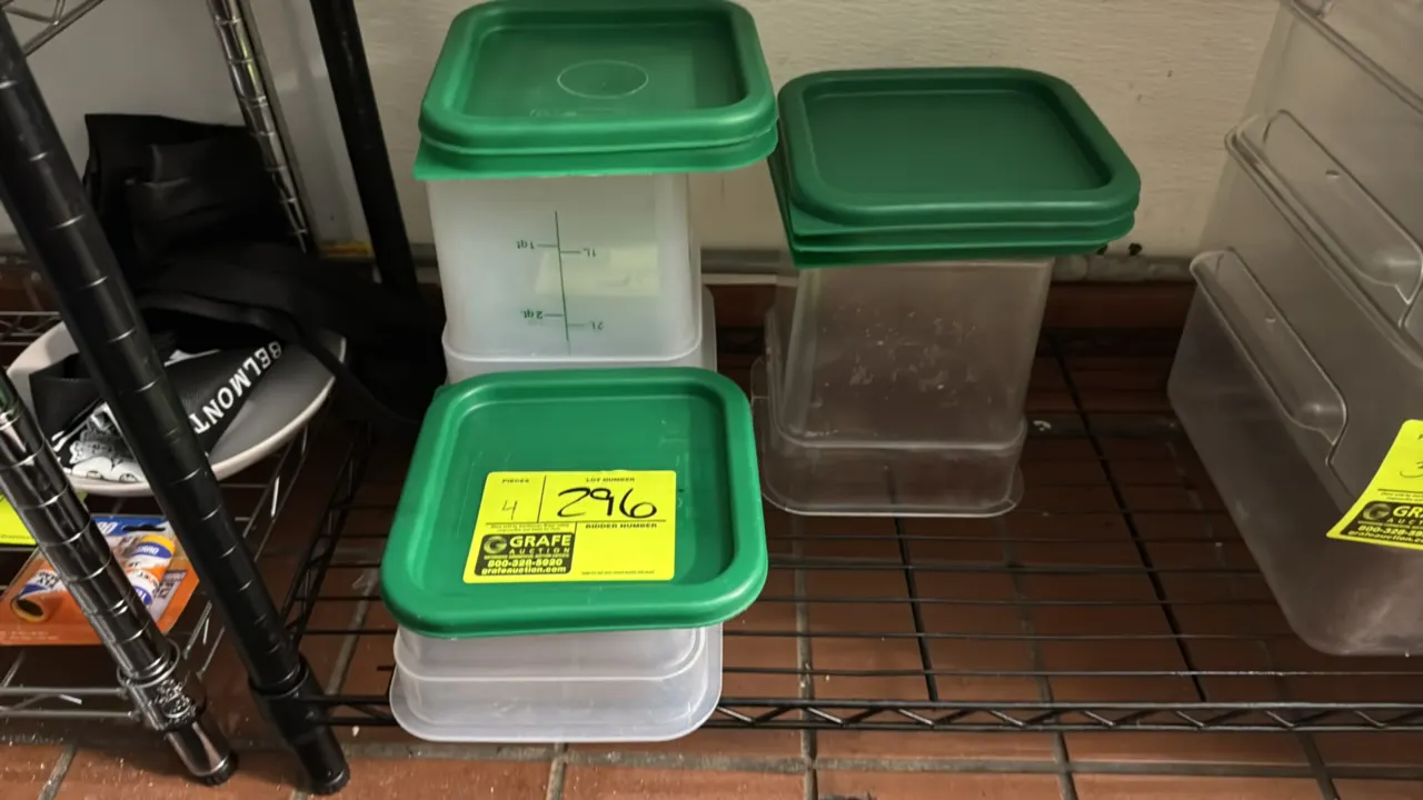 Cambro food storage containers. Features 2 qt and 4 qt capacities with graduated measurement markings and square design. Includes green plastic lids.