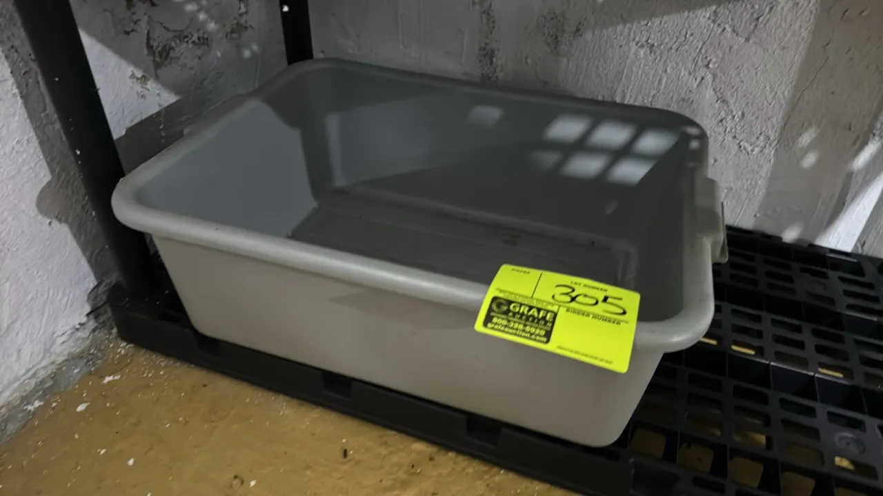 Poly bus tub. Features gray molded polyethylene construction with integrated side handles and a ribbed bottom. Shelving not included.